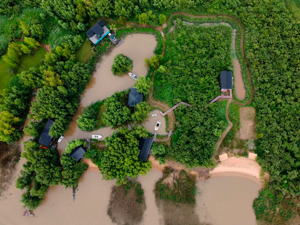 Aerial view of Isla Verde Lodge on the Urión River